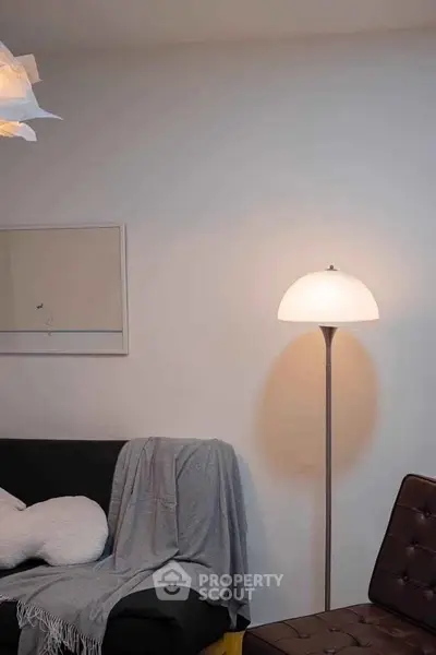 Cozy living room with modern floor lamp and stylish decor