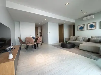 Spacious modern living room with elegant dining area and stylish decor