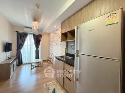 Modern living room with open kitchen and stylish decor