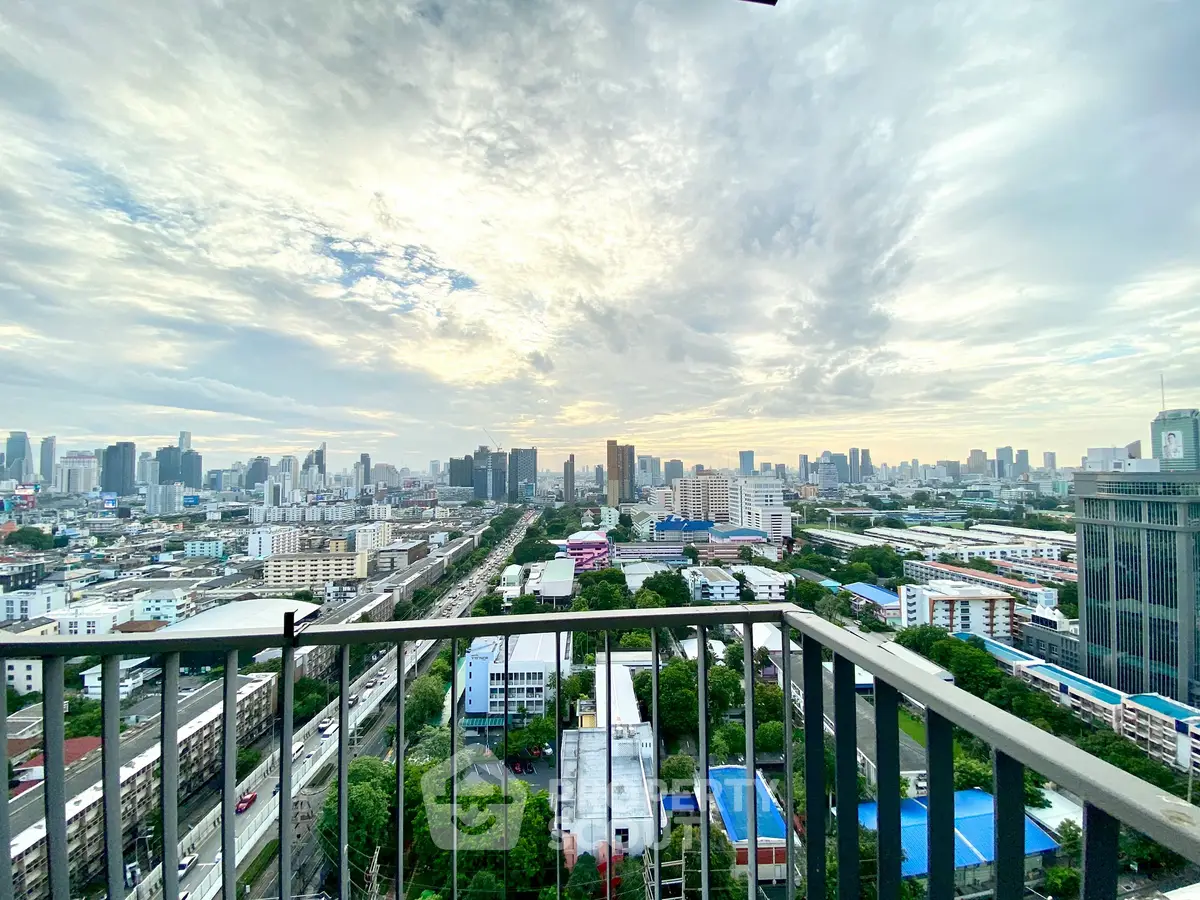 Stunning cityscape view from a high-rise balcony, perfect for urban living enthusiasts.