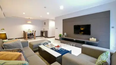 Spacious modern living room with stylish decor and dining area