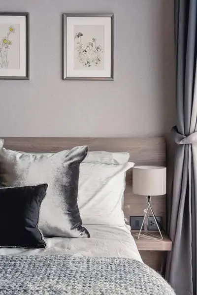 Elegant bedroom with stylish decor and cozy bedding