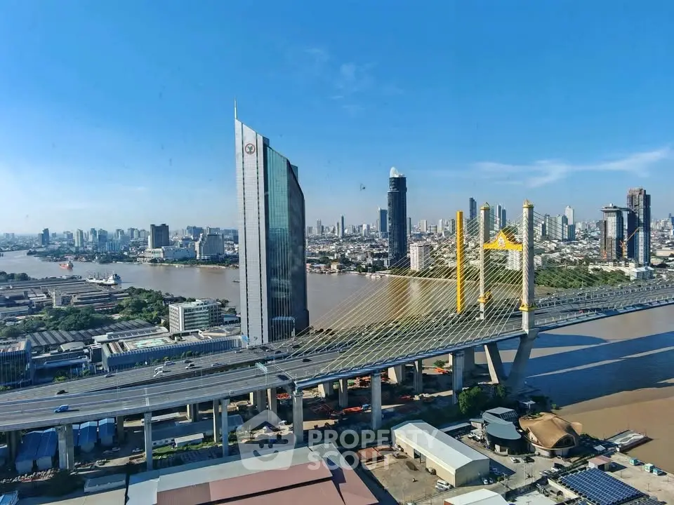 Stunning cityscape view with modern skyscrapers and a prominent bridge over a river, showcasing urban architecture.