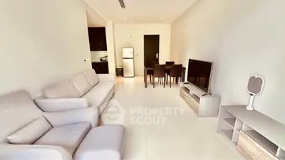 Spacious modern living room with sleek furniture and open layout
