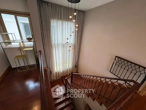 Elegant staircase with modern lighting in a stylish home interior
