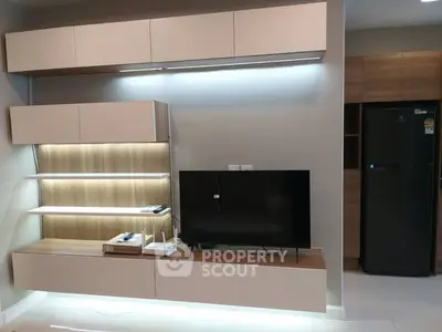 Modern living room with sleek TV unit and contemporary design