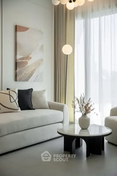 Elegant living room with modern decor and natural light