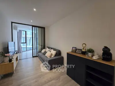 Modern living room with sleek furniture and natural light