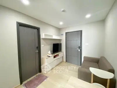 Modern living room with sleek furniture and neutral tones, perfect for cozy relaxation.
