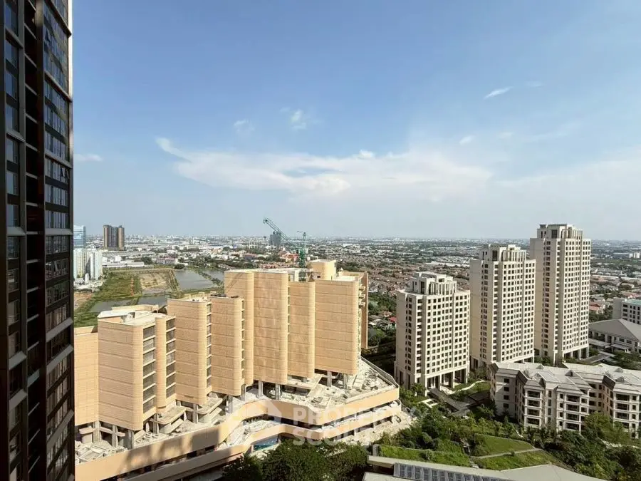 Stunning cityscape view from high-rise apartment balcony