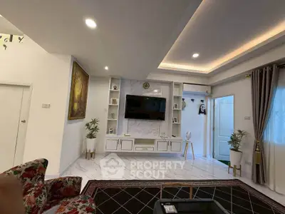 Modern living room with elegant decor and built-in TV unit