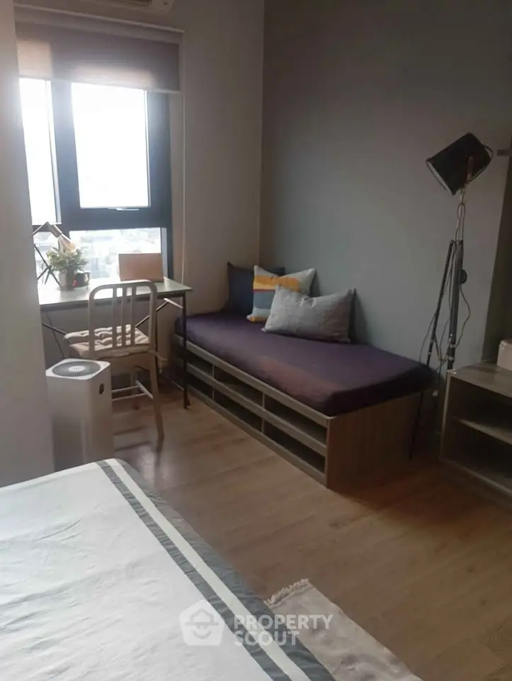 Cozy bedroom with modern decor and natural light