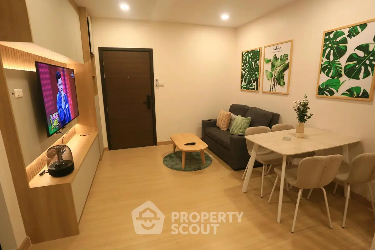 Modern living room with stylish decor and cozy seating area, perfect for relaxation and entertainment.