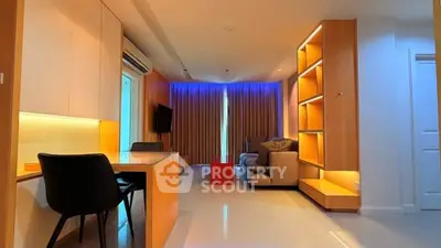 Modern living room with ambient lighting and sleek furniture design