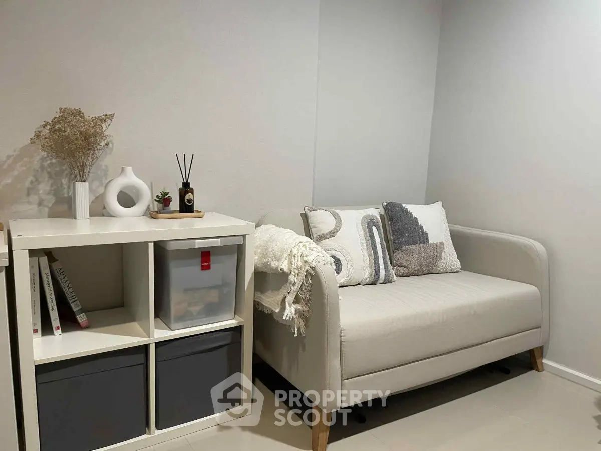 Cozy minimalist living room with stylish sofa and modern decor