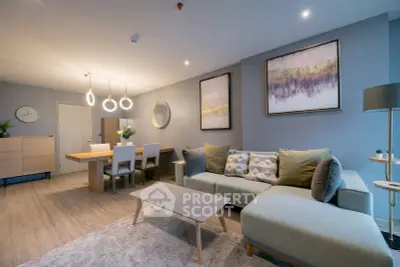 Modern living room with stylish decor and cozy seating area, perfect for relaxation and entertaining.