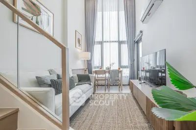 Stylish modern living room with high ceilings and elegant decor