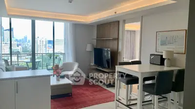 Modern living room with city view, stylish furniture, and open layout in urban apartment.