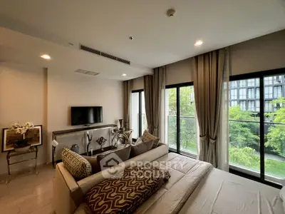 Luxurious bedroom with large windows and elegant decor in modern apartment