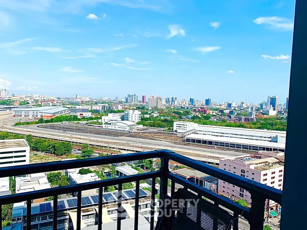 Stunning cityscape view from a high-rise balcony, perfect for urban living enthusiasts.