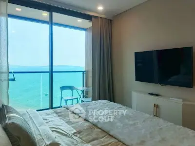 Luxurious bedroom with stunning ocean view and modern decor