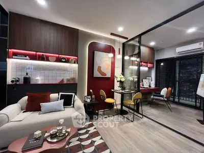 Modern living room with stylish decor and open layout, featuring cozy seating and elegant lighting.
