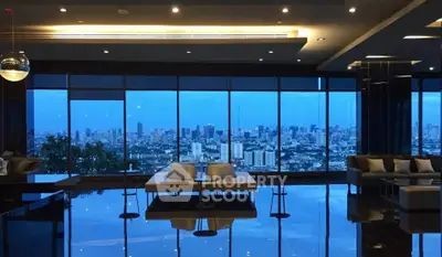Luxurious high-rise living room with stunning city skyline view.