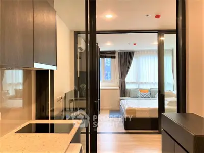 Modern studio apartment with open layout and stylish furnishings