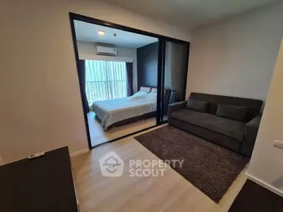 Modern apartment interior with cozy bedroom and stylish living area