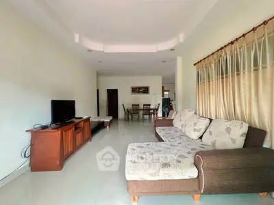 Spacious living room with elegant furniture and natural light
