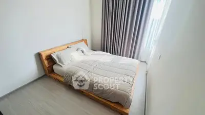 Modern minimalist bedroom with wooden bed frame and elegant curtains