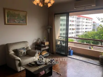 Cozy living room with balcony view in a modern apartment