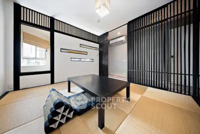 Elegant Japanese-style room with tatami mats and modern decor