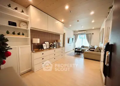 Spacious modern living room with elegant decor and ample natural light