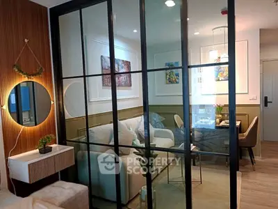 Modern living room with glass partition and stylish decor
