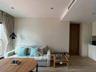 Modern living room with cozy sofa and stylish decor