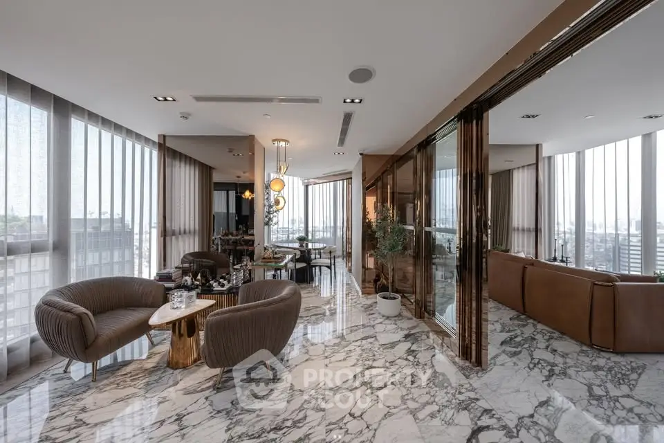 Luxurious modern living room with marble flooring and panoramic city views