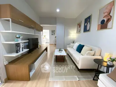 Modern living room with stylish decor and wooden flooring
