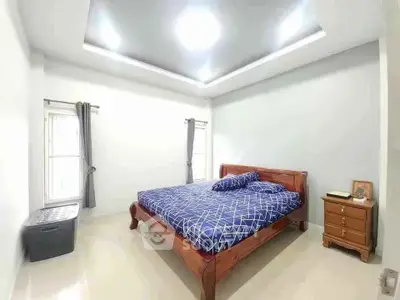 Spacious bedroom with modern design and elegant wooden furniture