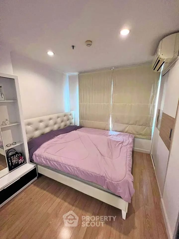 Cozy bedroom with modern decor and natural light