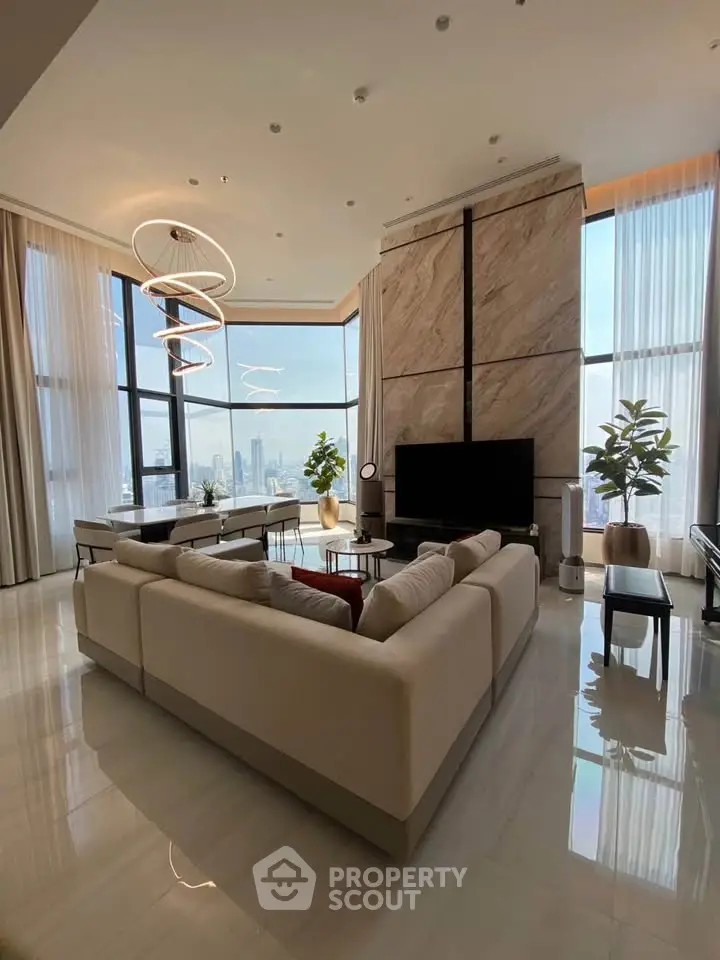 Luxurious living room with panoramic city views and modern decor