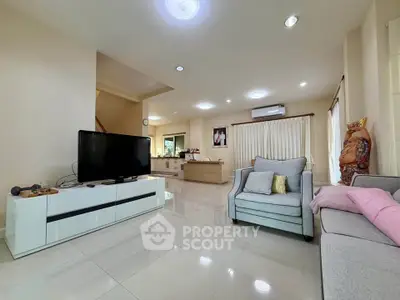 Spacious modern living room with sleek furniture and natural light