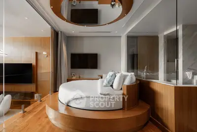 Luxurious modern bedroom with round bed and elegant wooden accents