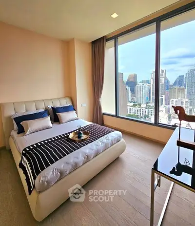 Luxurious bedroom with stunning city view and modern decor