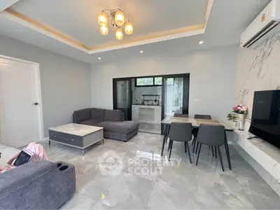 Modern living room with sleek furniture and elegant lighting