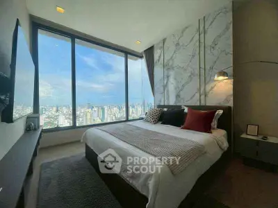 Luxurious bedroom with stunning city view and modern decor