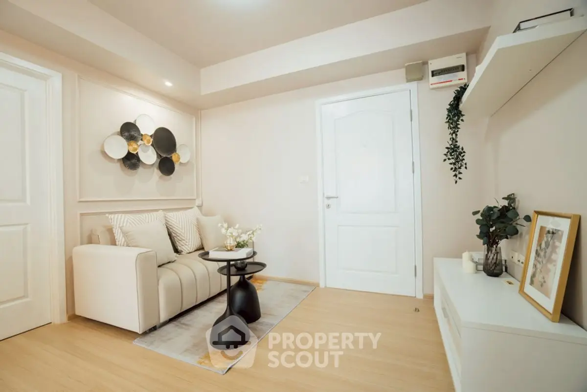 Chic modern living room with stylish decor and cozy seating area.