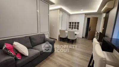 Modern living room with stylish furniture and elegant lighting