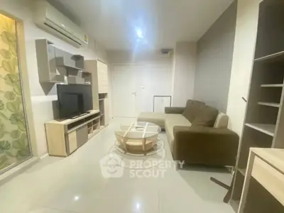 Modern living room with sleek furniture and air conditioning, perfect for relaxation and entertainment.