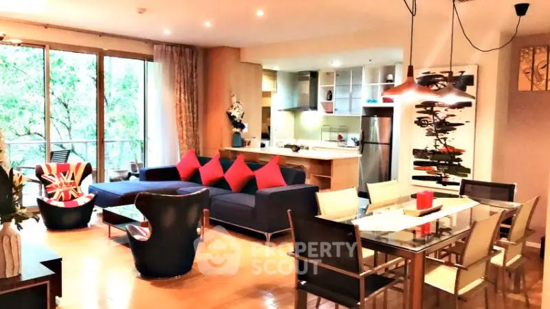 Spacious modern living room with open kitchen and stylish decor